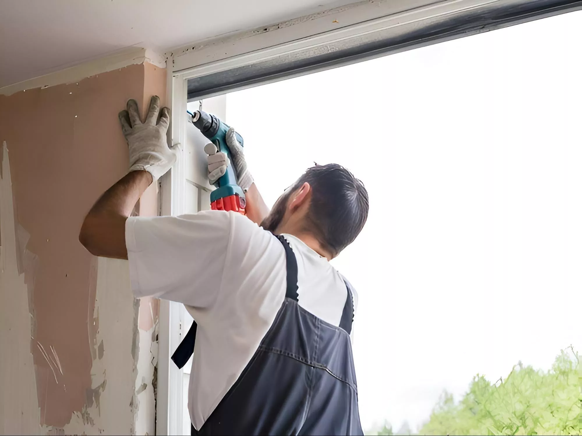 Image Of A Carpenter Fixing A Window | Window Fixer Near Me | Sydney Decking Solutions