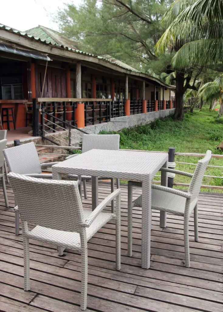image of a table and chairs on a deck made with timber